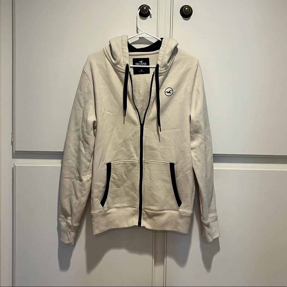 White/cream with black details Hollister zip up hoodie
